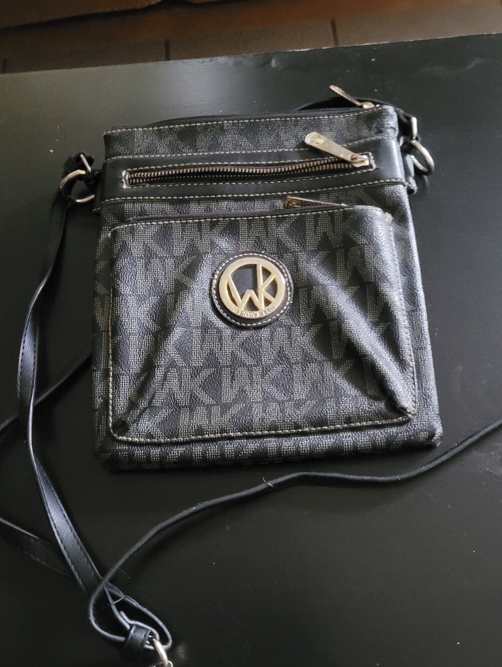 Wendy Keen Black Crossbody Bag with Gold Emblem